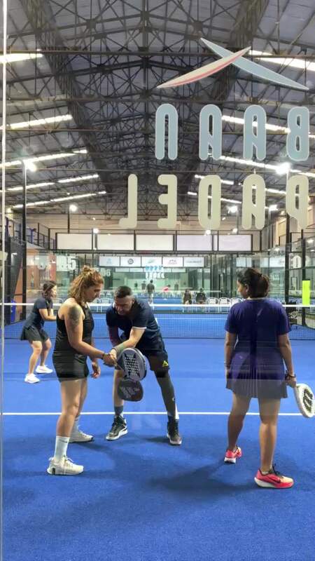 Baan Padel coach adjusting a player's grip